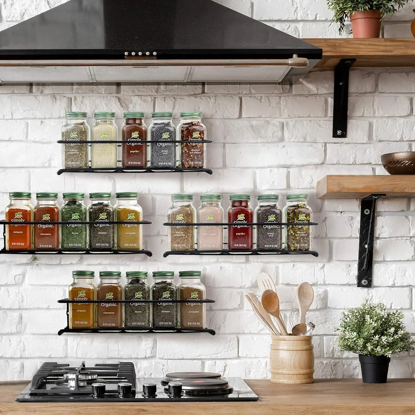 spice rack mounted above stove in kitchen