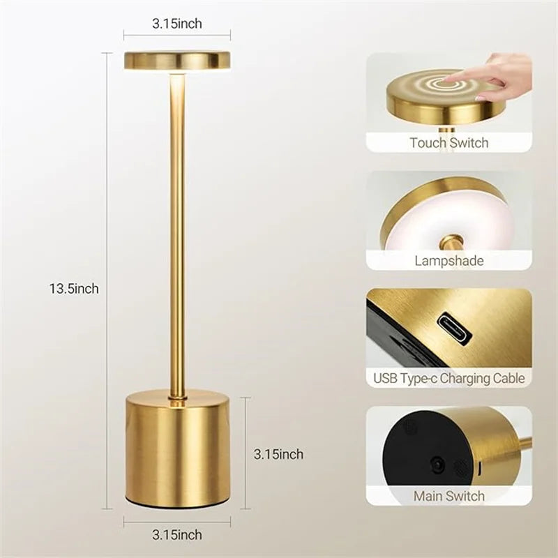 Gold table lamp with dimensions and features highlighted on a white background