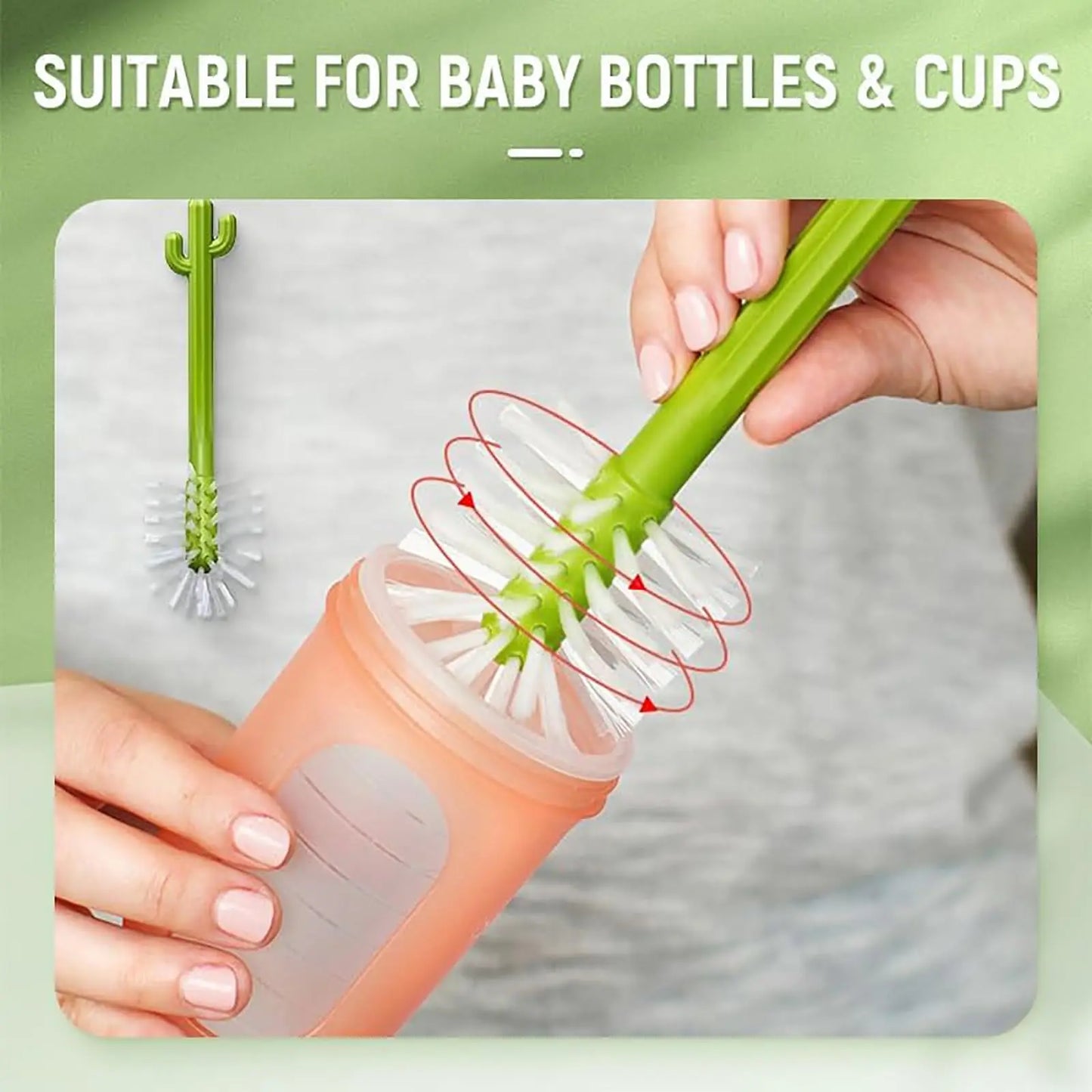 Green brush with bristle head being used on a baby bottle against a green background