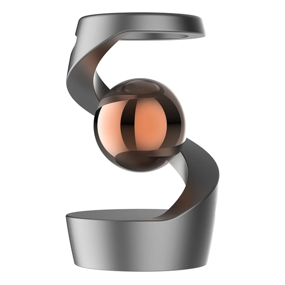 grey and gold Gravity Defying Kinetic Desk Spinner