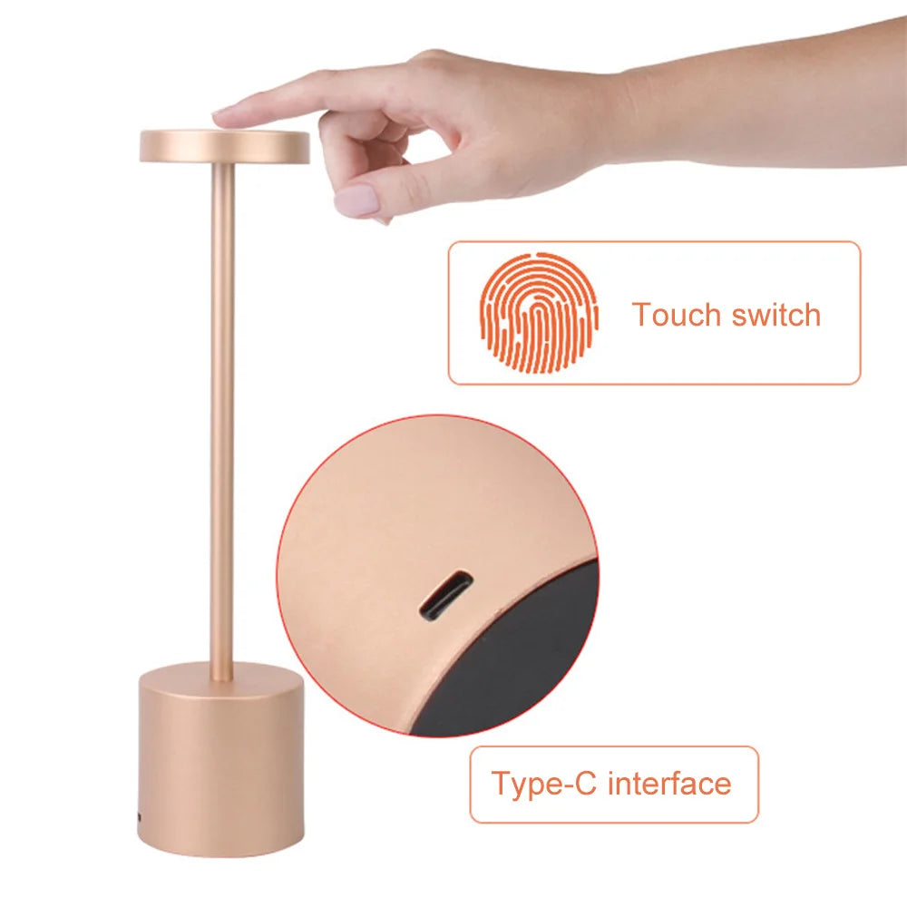 Rose gold lamp with touch switch and Type-C interface on a white background