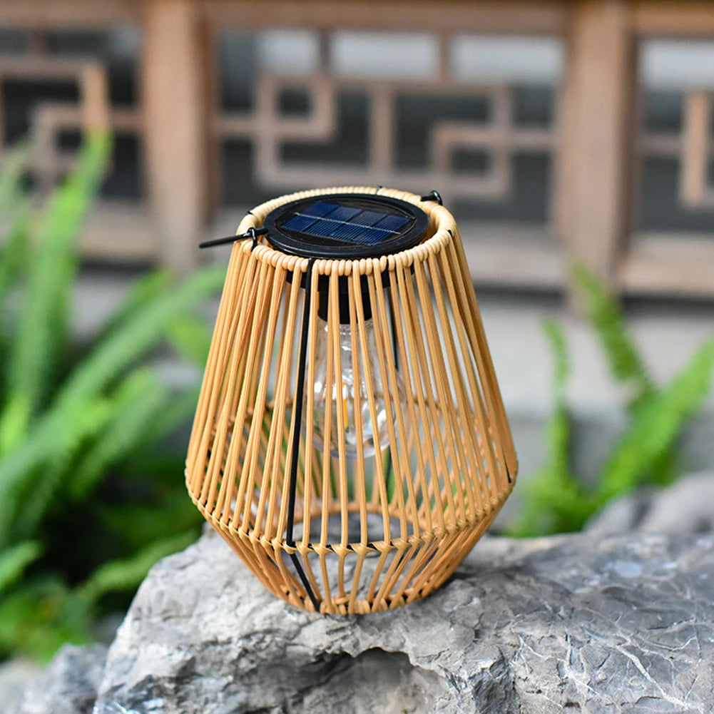 Bamboo solar lantern on a rock with a blurred background