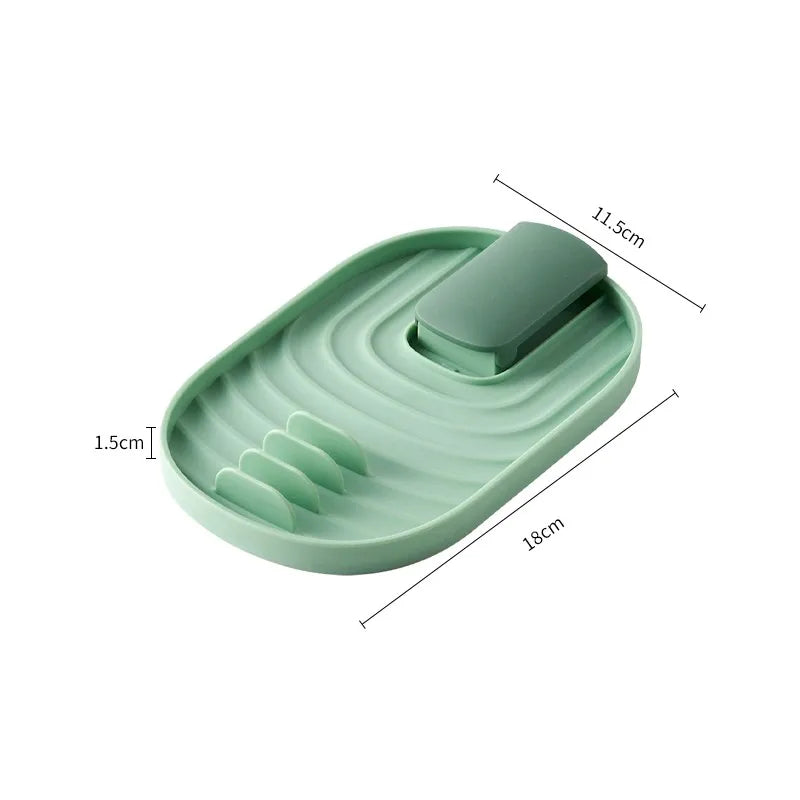 green spatula and lid holder