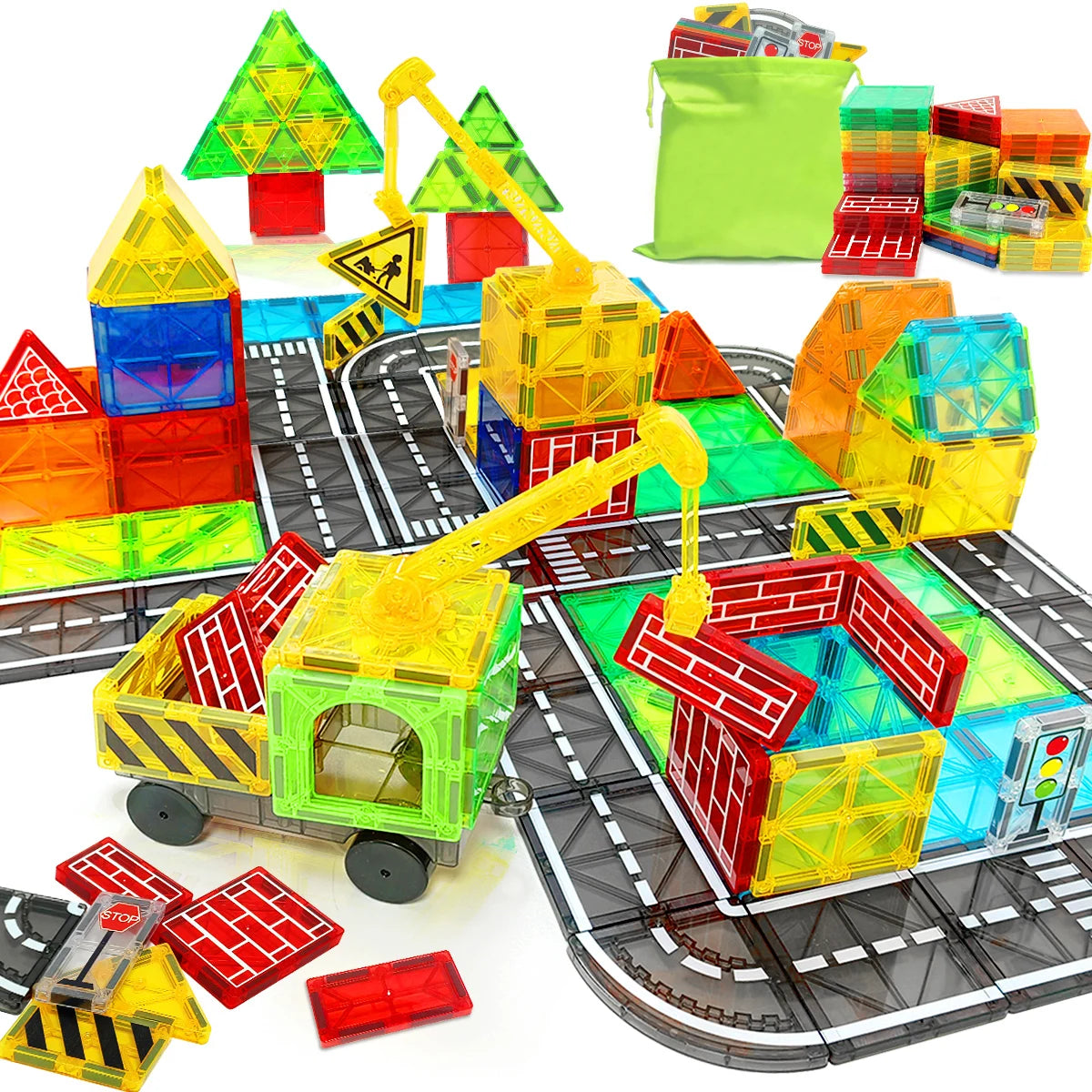 Colorful toy construction set with tracks and buildings on a white background