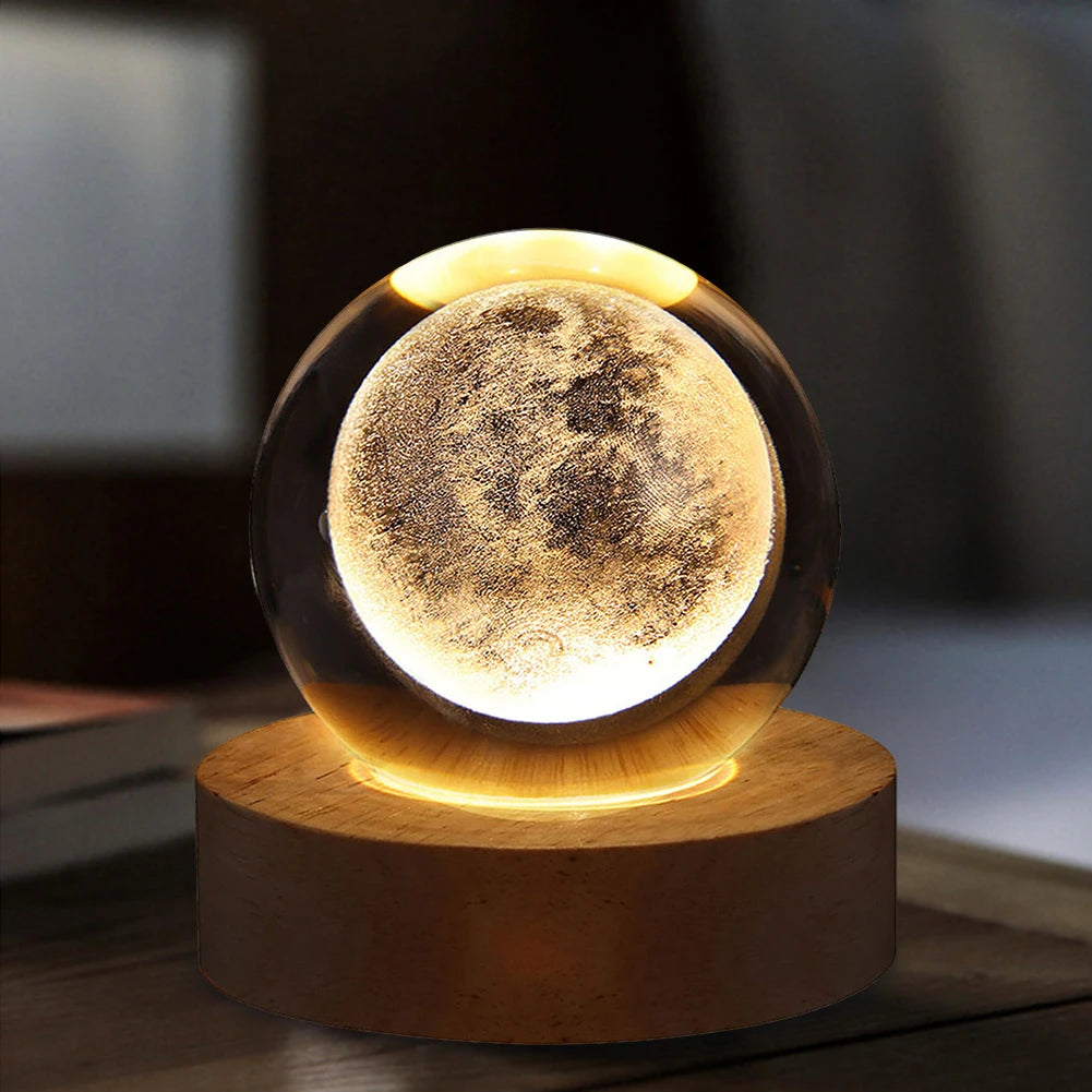 Moon lamp on a wooden base with a blurred background