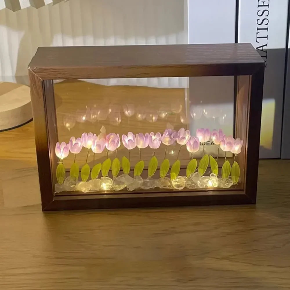 DIY wooden tulip light box with glowing purple LED flowers and green leaves, used as ambient home decor