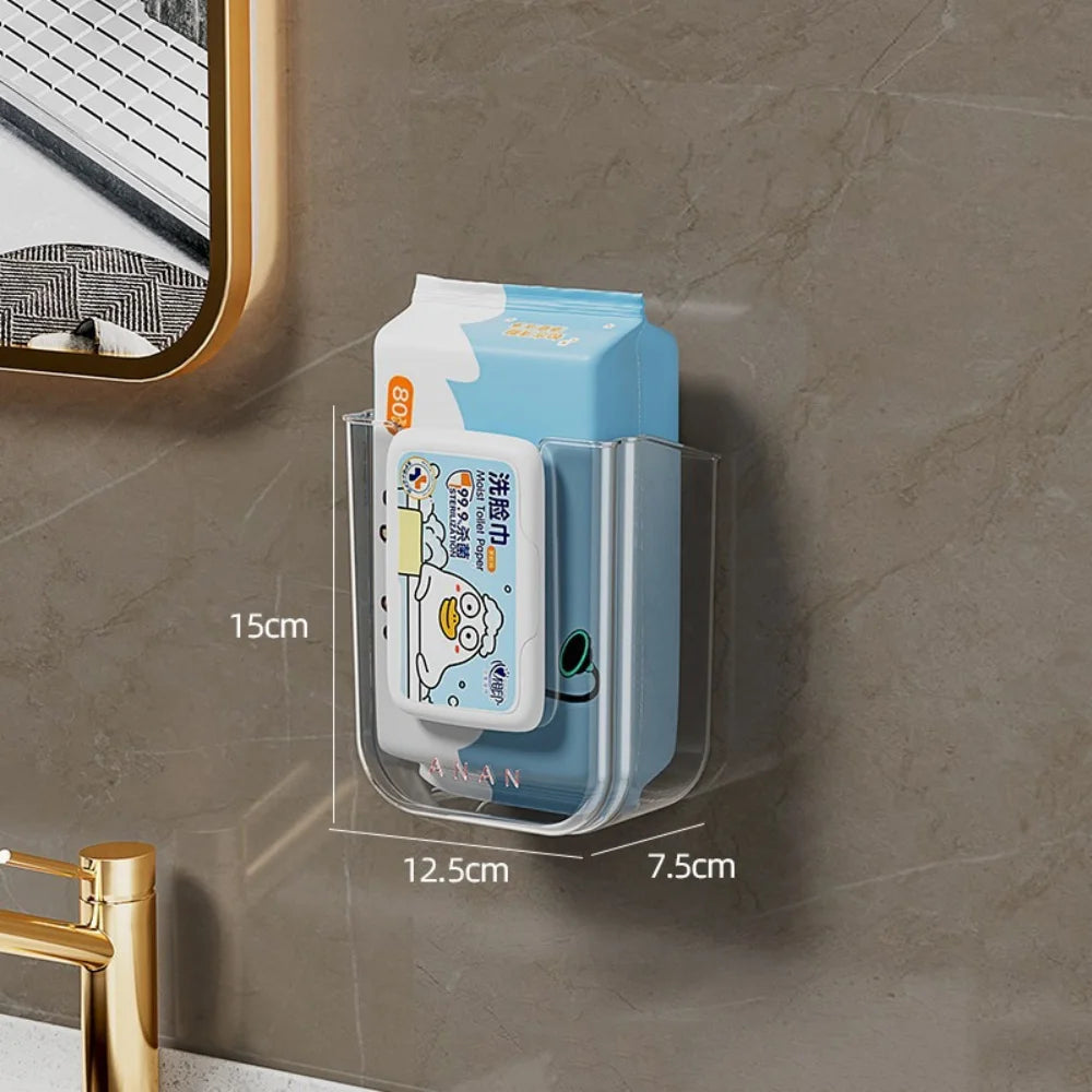 Wall-mounted tissue holder with tissues on a bathroom wall