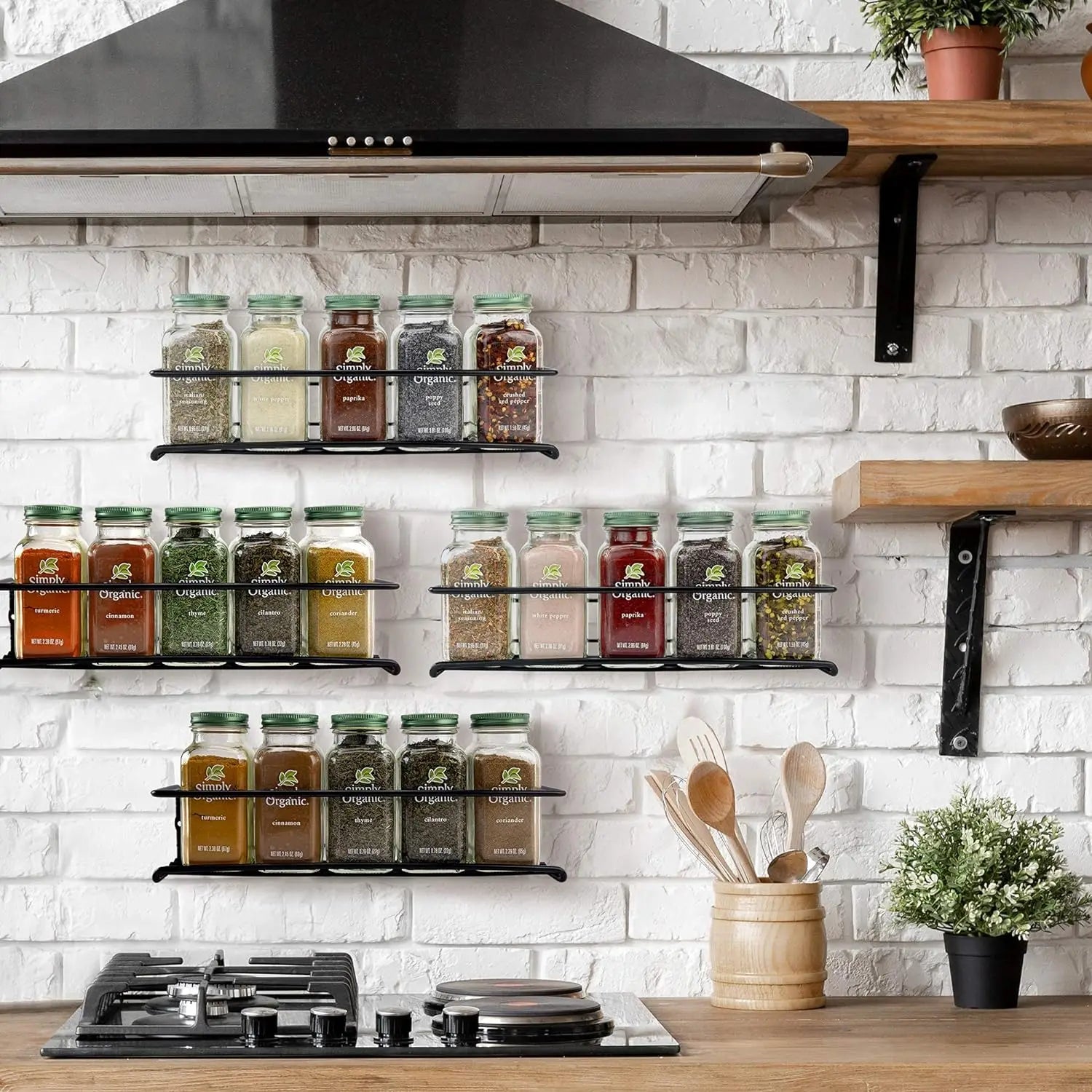 spice rack mounted above stove in kitchen