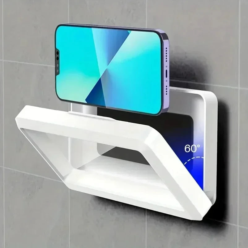 Phone holder with digital temperature display on a tiled wall