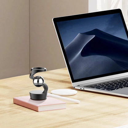 Gravity Defying Kinetic Desk Spinner on desk