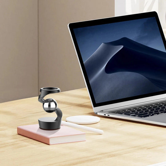 Gravity Defying Kinetic Desk Spinner on desk