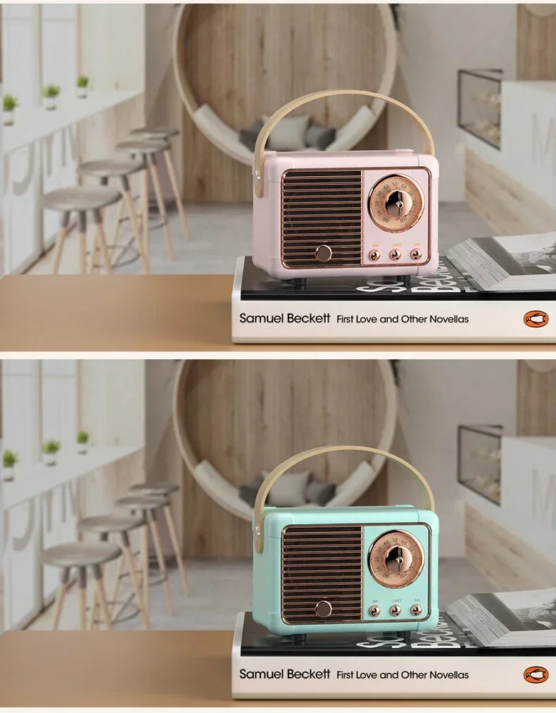 Two retro Bluetooth speakers in pink and mint green displayed on books in a modern café-style setting